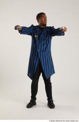 Garson STANDING POSE WITH GUNS 